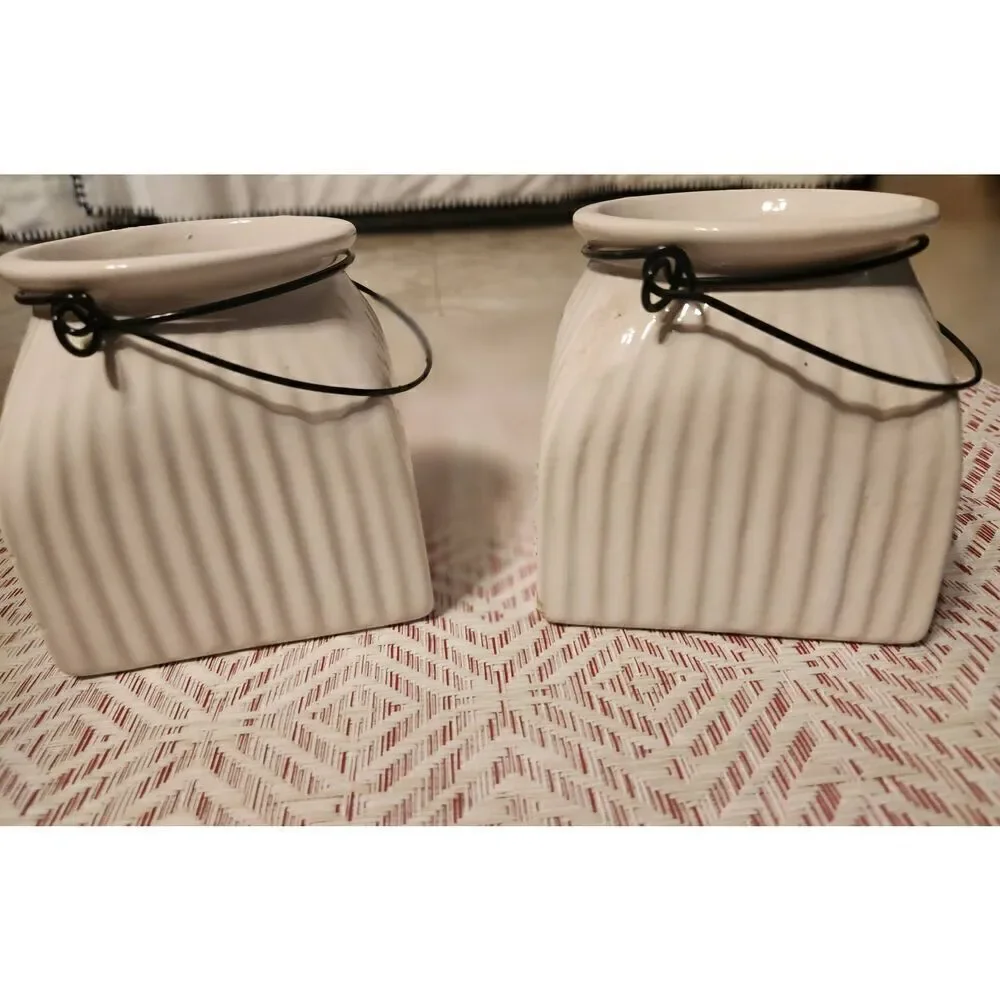 Napco cream ceramic jars with metal wire hangers
